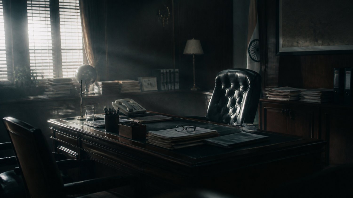 Mishra’s Office — A crisp, tired bureaucrat’s room carrying the weight of the PMO — the political ceiling above the case.