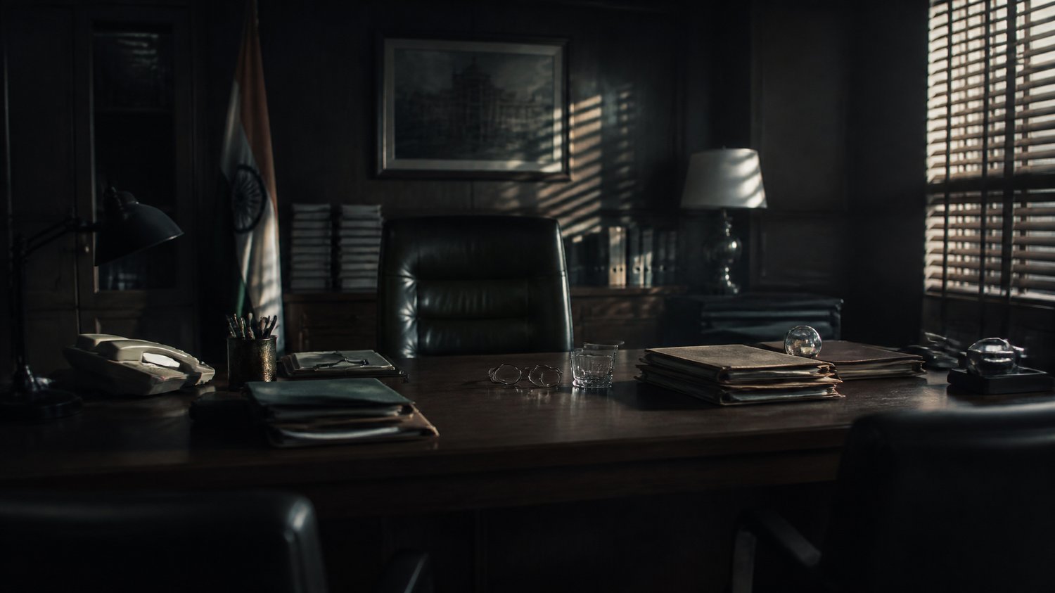 Mishra’s Office — A crisp, tired bureaucrat’s room carrying the weight of the PMO — the political ceiling above the case.