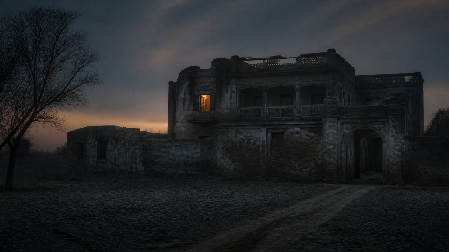 Rajjo Sadan (Exterior) — A crumbling ancestral village house off the GT Road — dust, dry fields, a siege at dusk. Where Satpal ends.